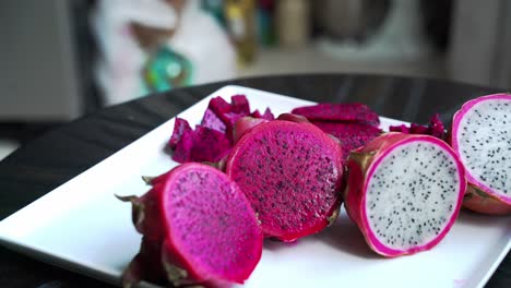 Quick-zoom-in-of-white-dragon-fruit-Close-up-of-Red-and-white-dragonfruit-Red-Dragon-Fruit-Slices-and-Cultivating-Exotic-Plants-pitaya