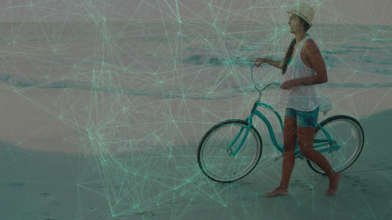 Person walking bicycle on beach with network of connections animation overlay
