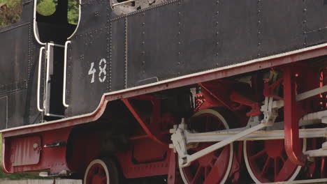 old fashioned steam engine train on sunny day near bakuriani, georgia