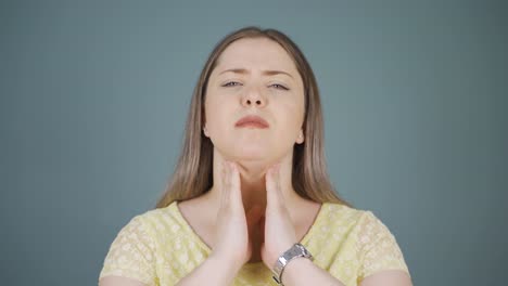 young woman with sore throat.