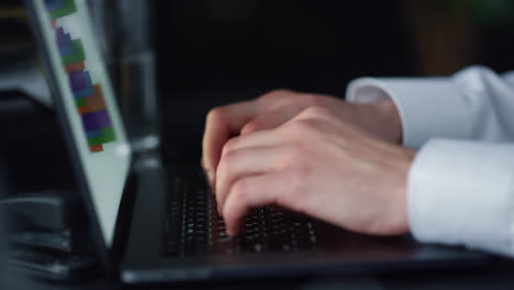 Businessman-typing-on-laptop-keyboard-in-office.-Person-pushing-keys-on-keyboard