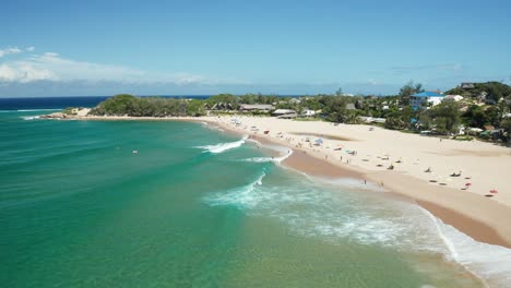 forward moving drone shot above the shoreline of tofo, mozambique