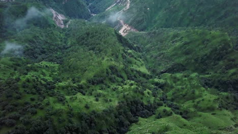 aerial view of lush green mountains and valley