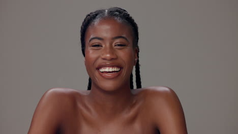beautiful black woman smiling with braids
