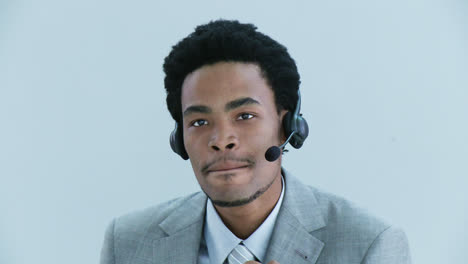 close up of businessman talking on a headset