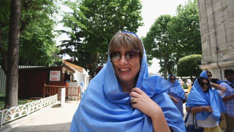 a young muslim woman in a scarf goes to the mosque, istanbul. summer vacation, travel. hispanic girl, iranian, syrian woman