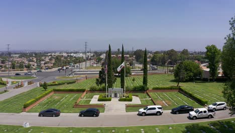 aerial close-up and pushing in shot of a veteran's war memorial at a california mortuary