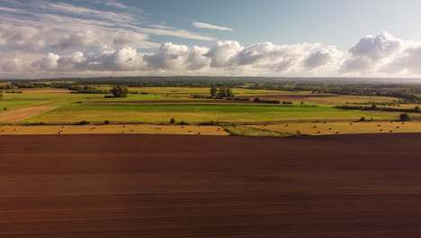 rising over fields providing different crops
