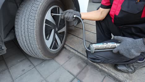 sequential process of a tire change demonstrated