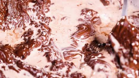 chocolate and milk blend in swirling motion