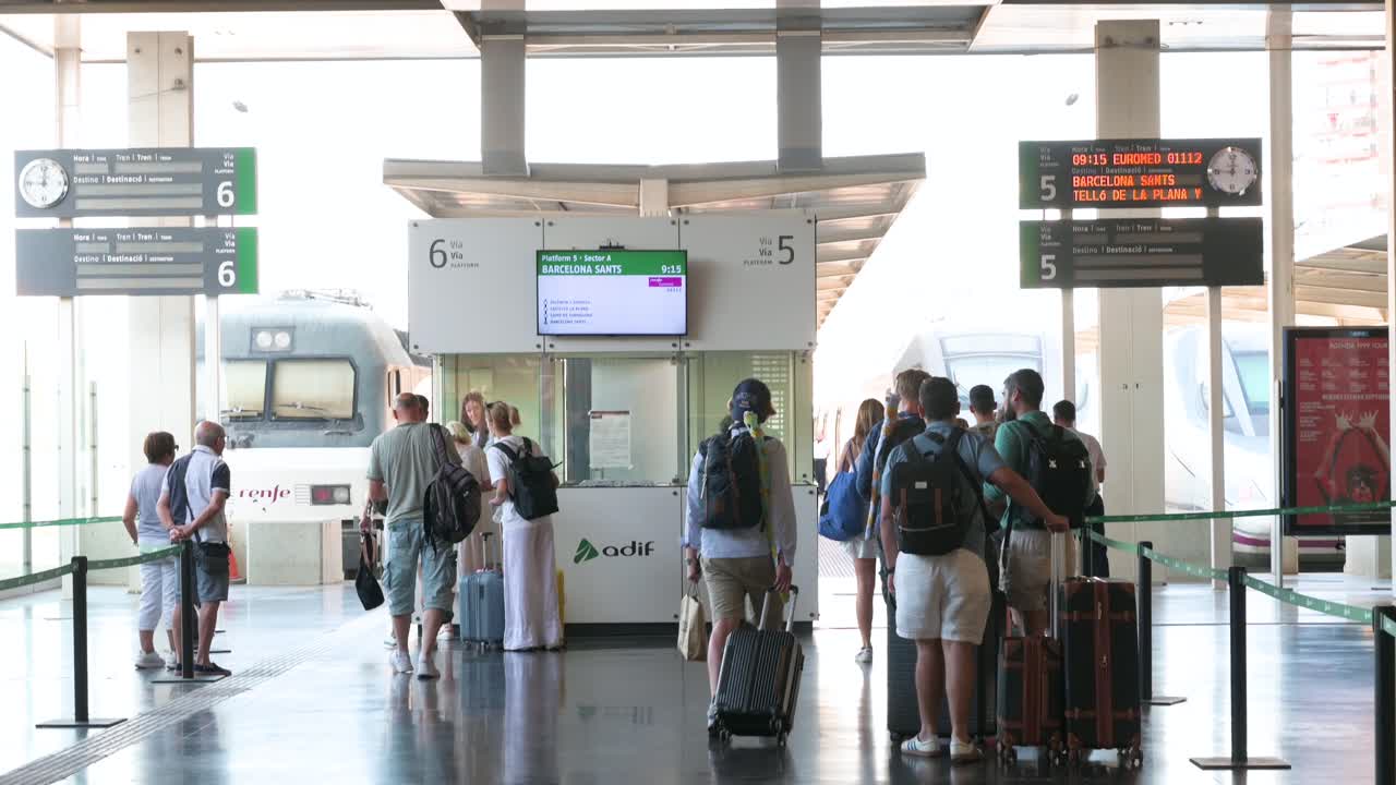 Passengers Waiting at Barcelona Sants Train Station