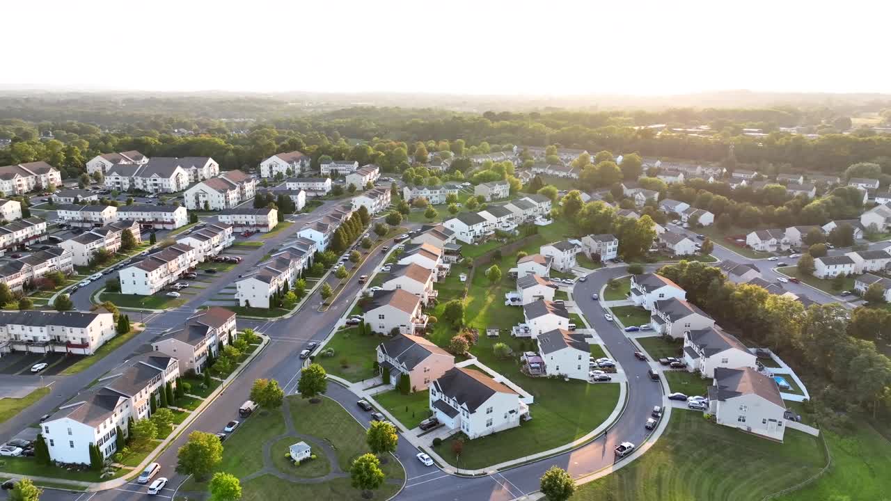 Aerial shot of American neighborhood during golden sunset