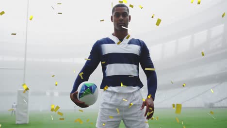 Animation-of-gold-confetti-falling-over-mixed-race-male-rugby-player-looking-at-the-camera