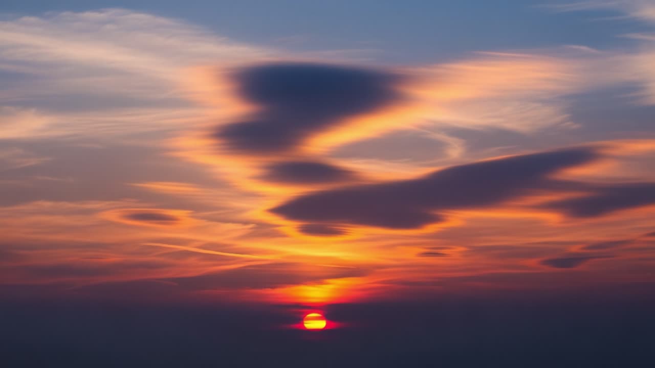 Vibrant Sunset Sky with Dramatic Cloud Formations