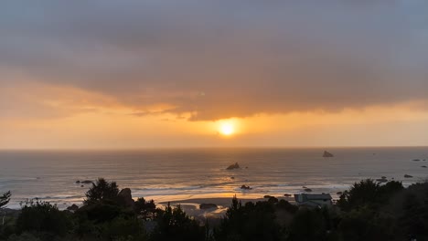 amazing sunset view, time lapse over pacific ocean, clouds moving quickly