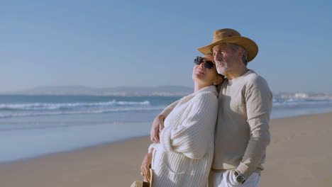 senior couple enjoying wonderful seascape view