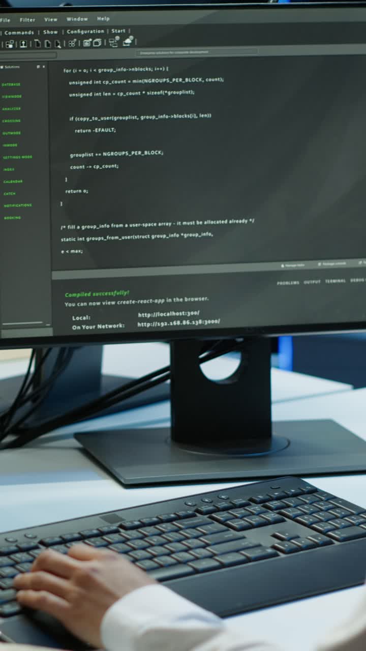 Programmer's Hands Typing Code on Computer Keyboard