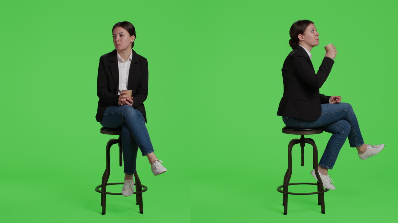 Businesswoman drinking coffee on green screen