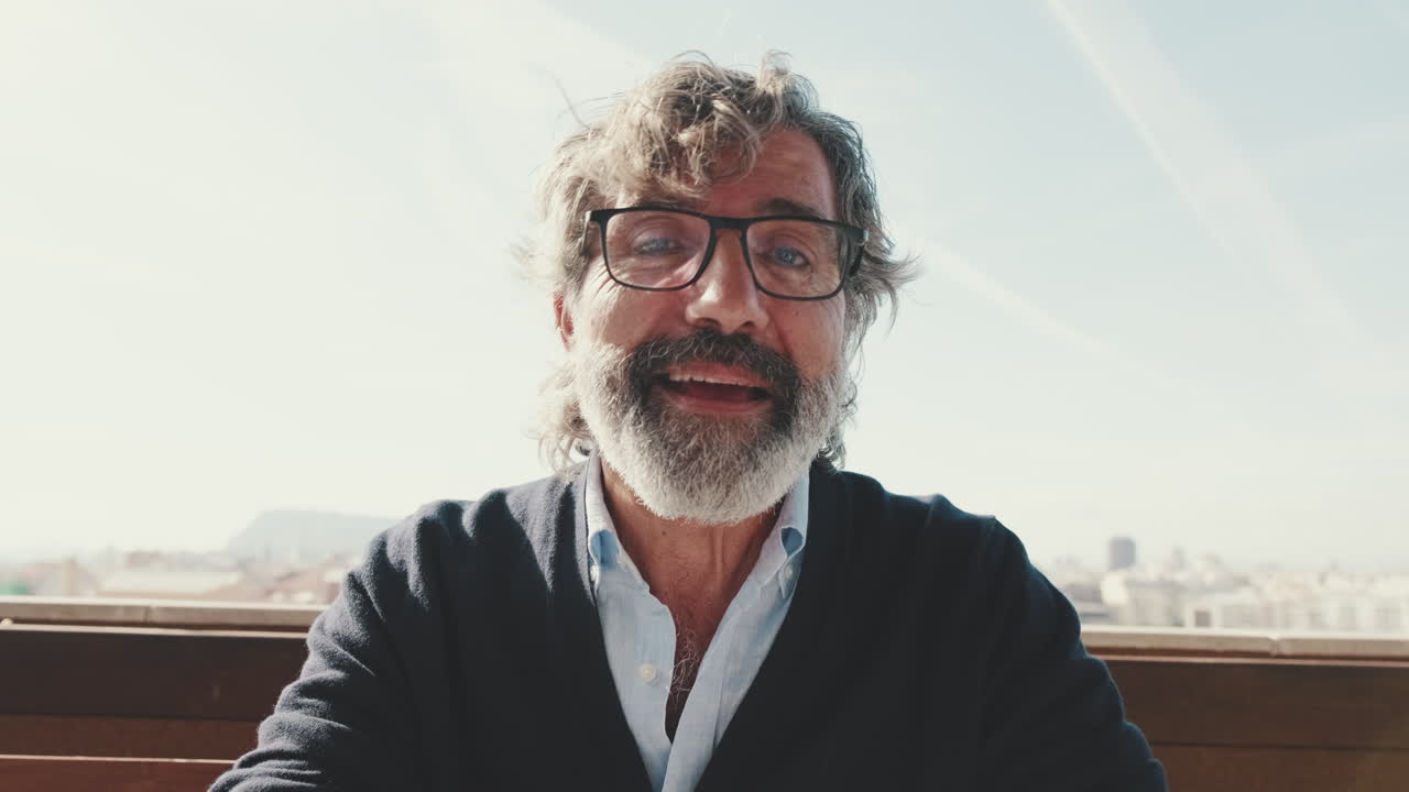 Portrait of a Smiling Man with Glasses