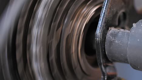 close up shot rear spinning bicycle gear for healthy exercise and sport