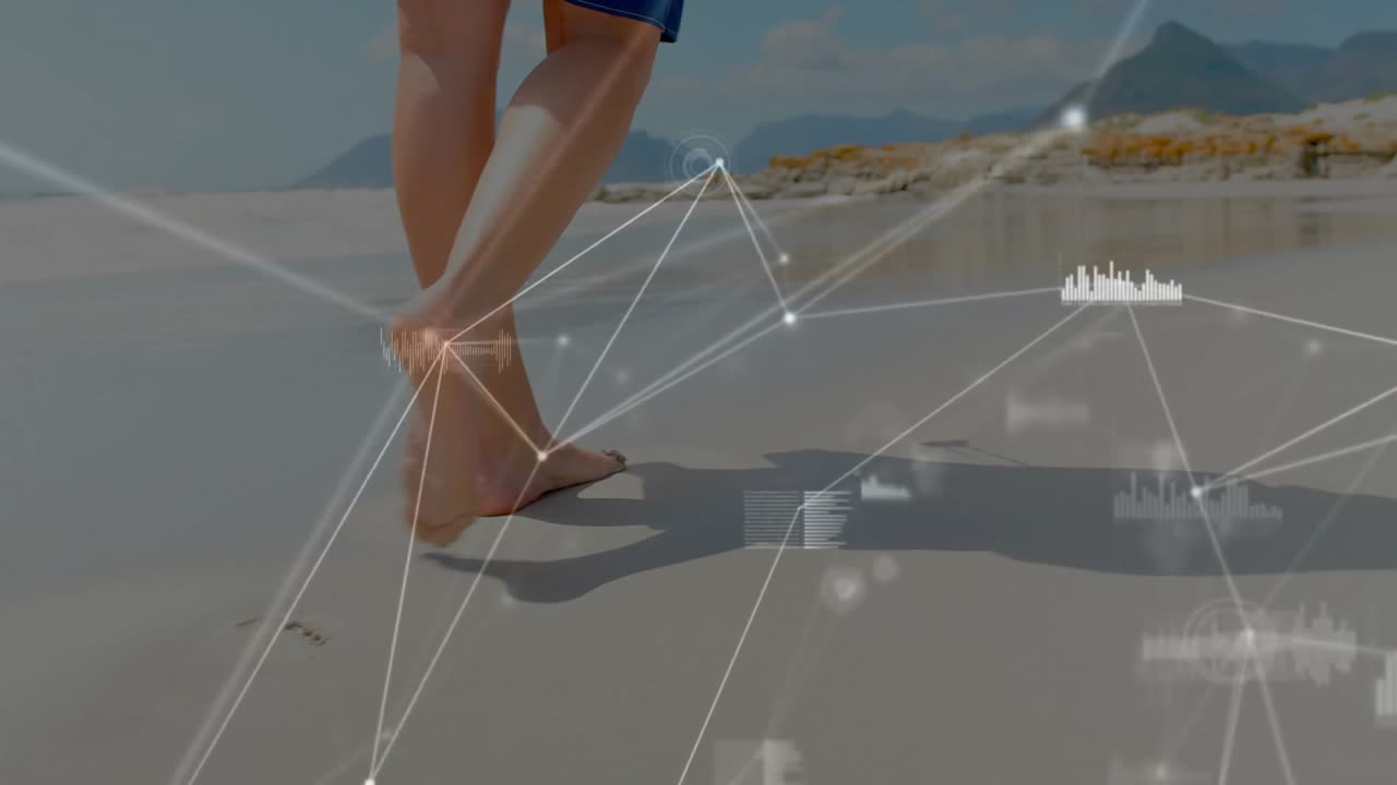 Uomo che cammina su una riva bagnata, avviando una sovrapposizione di dati tecnologici intorno ai piedi per il tracciamento dell'andatura