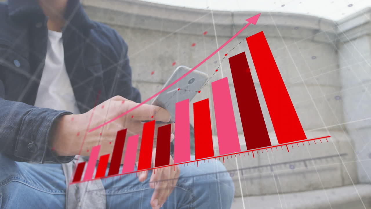 animación de diagrama rojo sobre un hombre biracial usando un teléfono inteligente