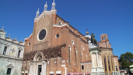 wide shot of basilica dei santi giovanni e paolo in venice, italy on a sunny day