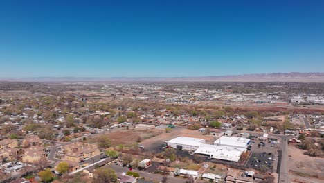 High-elevation-drone-aerial-view-of-the-Colorado-river-going-through-grand-Junction