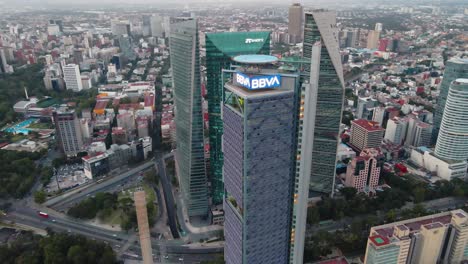 aerial view around the bbva tower, the ritz - carlton and the banorte skyscrapers, in río rodano, juarez, mexico city, in central america - orbit, drone shot