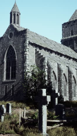 old stone church with graveyard