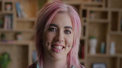 portrait-of-young-punk-woman-smiling-happy-wearing-pink-funky-hairstyle-face-piercings-beautiful-successful-caucasian-woman-alternative-fashion-style-individuality