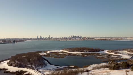 Snow-forest,-wetland-and-bay,-Squantum,-Massachusetts