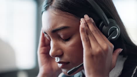 stressed customer service representative with headset