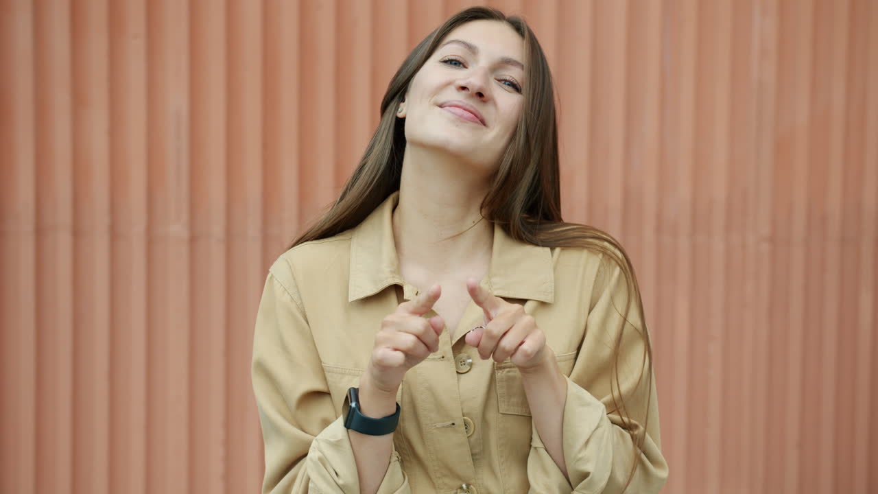 Woman Smiling and Pointing, Woman with Arms Crossed