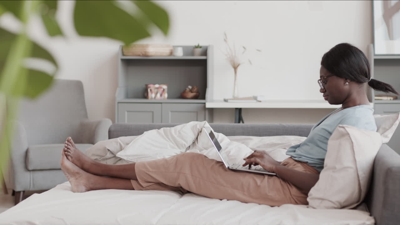 Young African-American Woman Working from Home