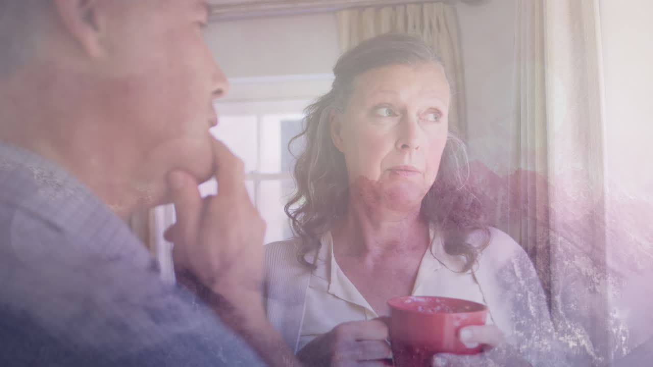 커피를 마시는 백인 부부 위의 겨울 풍경 애니메이션