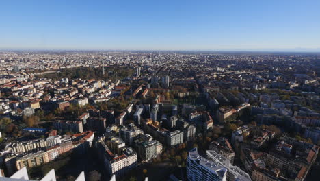 endless cityscape of milan, aerial drone view