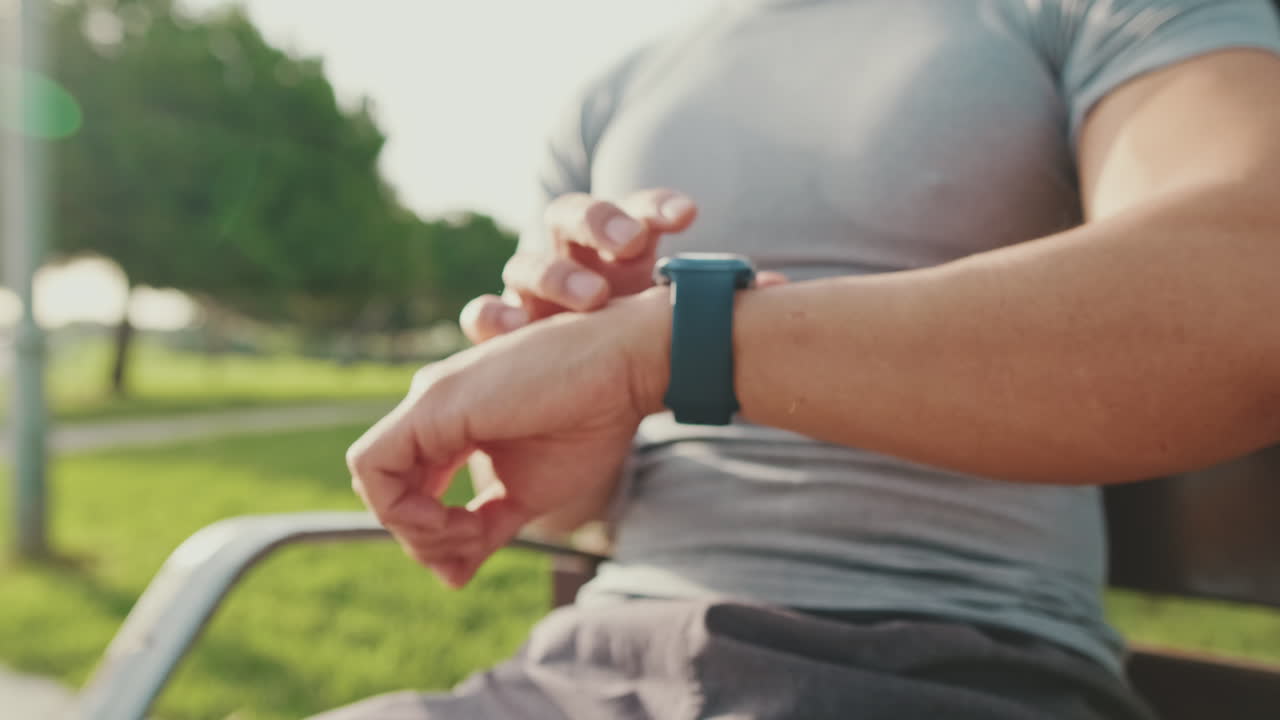 Man Using Smartwatch Outdoors