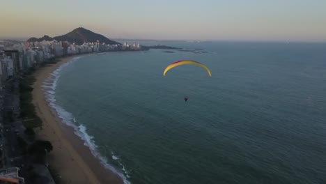 paragliding over the ocean coastline
