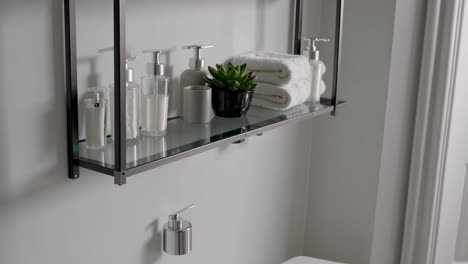 modern bathroom wall shelf with accessories
