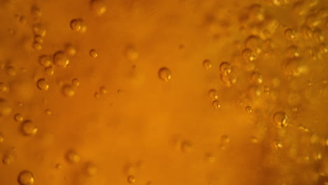 bubbles in amber liquid