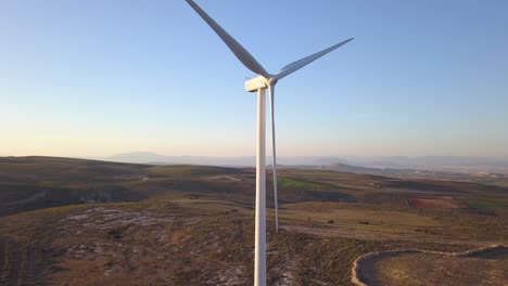 Aerial-ascending-view-of-a-windmill-in-the-south-of-Spain