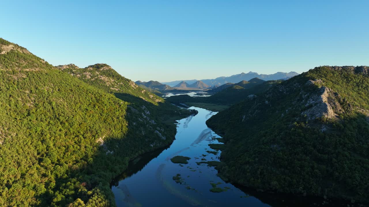 Skadar Lake - A Stunning Freshwater Lake Surrounded by Lush Mountains and Rich Wildlife, Located on the Border of Montenegro and Albania - Aerial Drone Shot