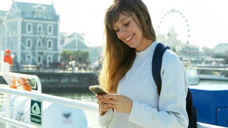 woman using mobile phone while travelling in ferry 4k