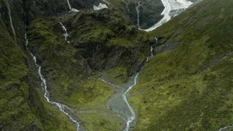 Dramatic-landscape-at-Rob-Roy-glacier-with-melt-water-rivers,-New-Zealand