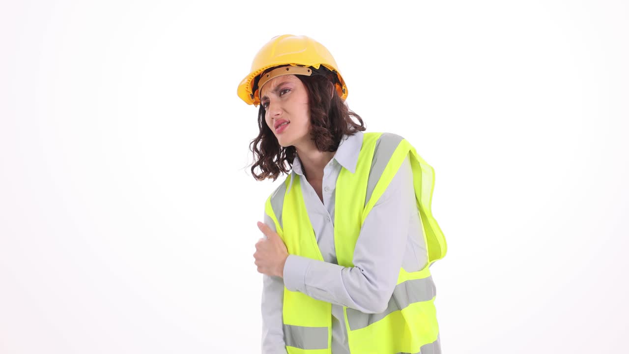 Woman Construction Worker Experiencing Shoulder Pain