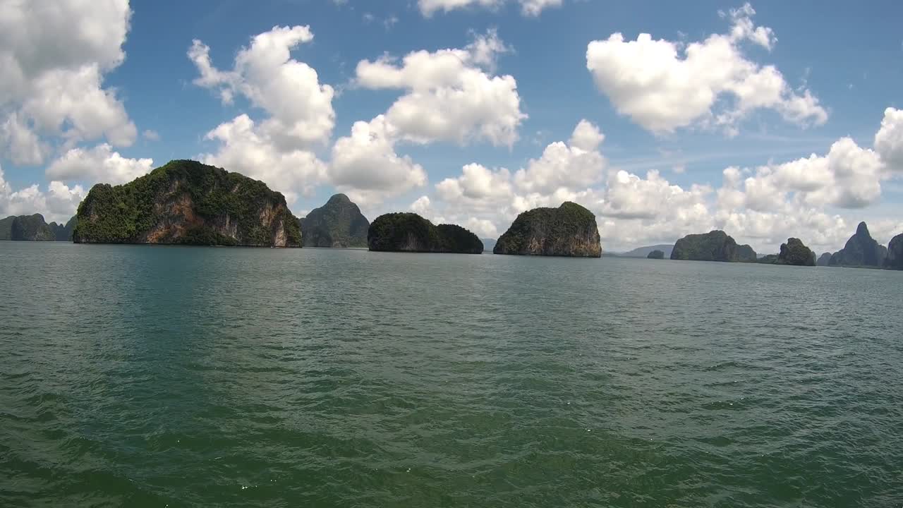 on boat in Thailand side moving right to left