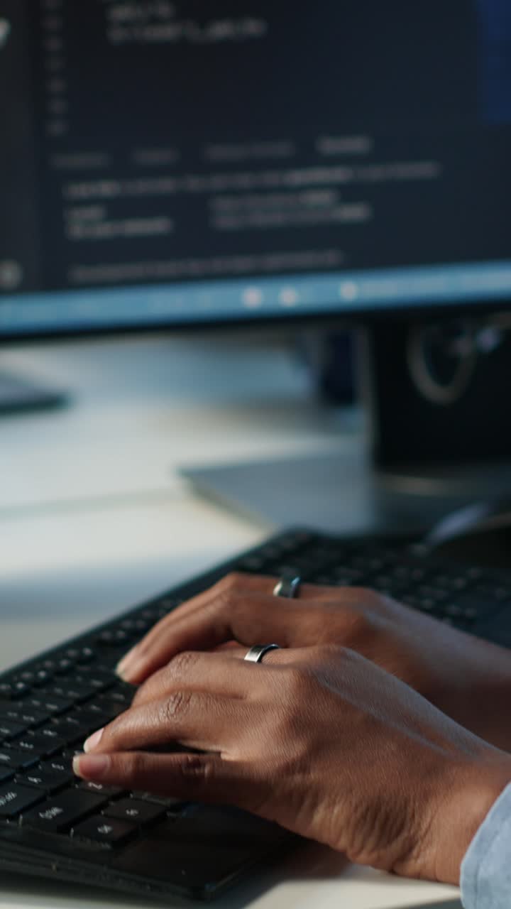 Close Up of Hands Typing Code on Computer Keyboard