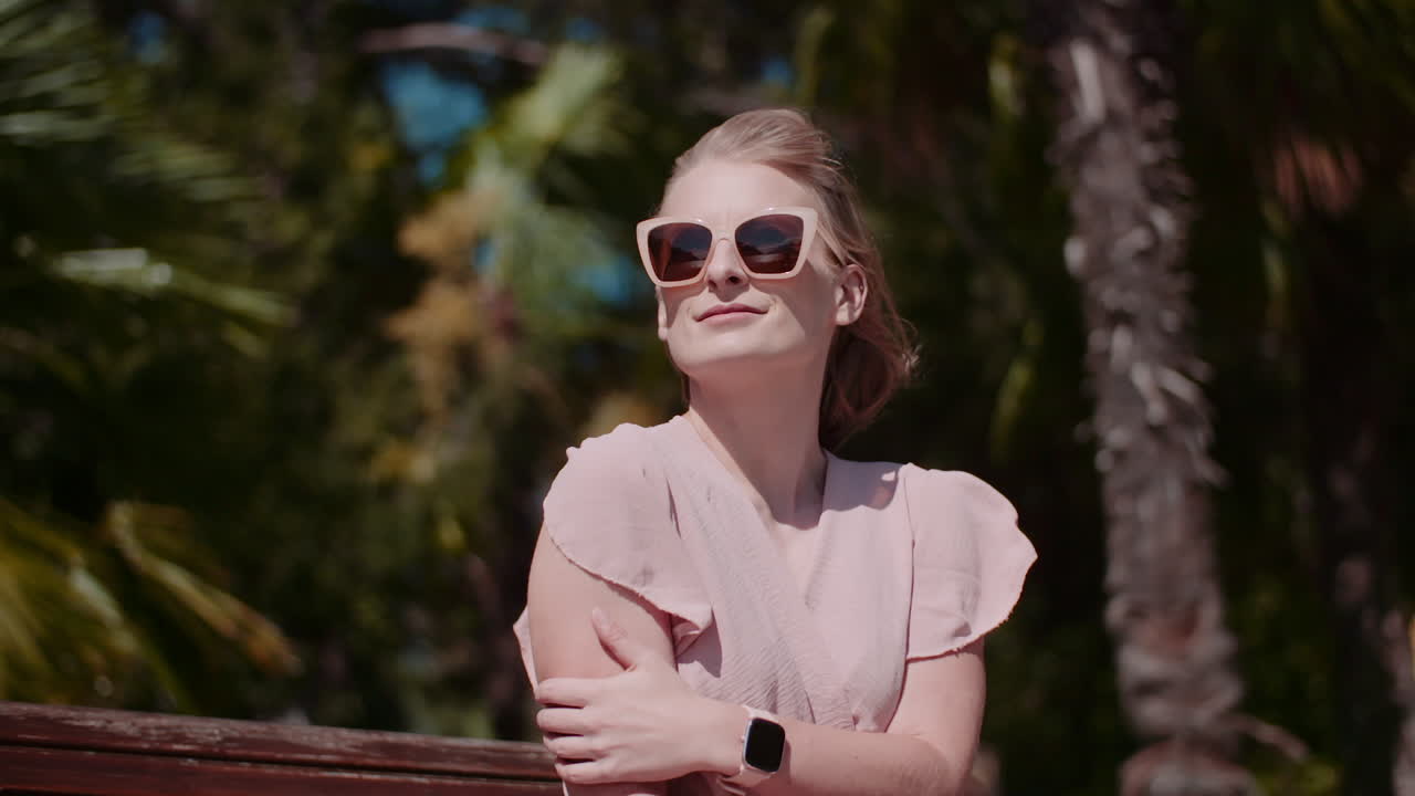 Close-Up of Happy Sunbathing Woman in Park