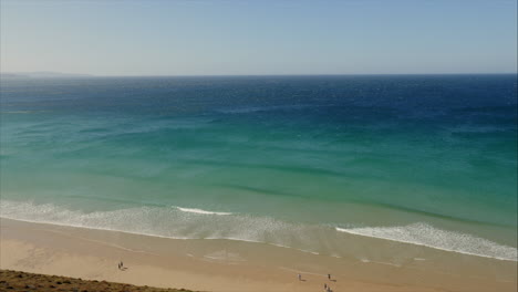 Coastline-scenic-wide-angle-shot-of-sea-waters-in-Cornwall-with-blue,-green,-turquoise-colours